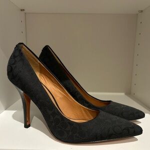 Navy blue Coach Women’s Pumps, size 7, in excellent condition.
